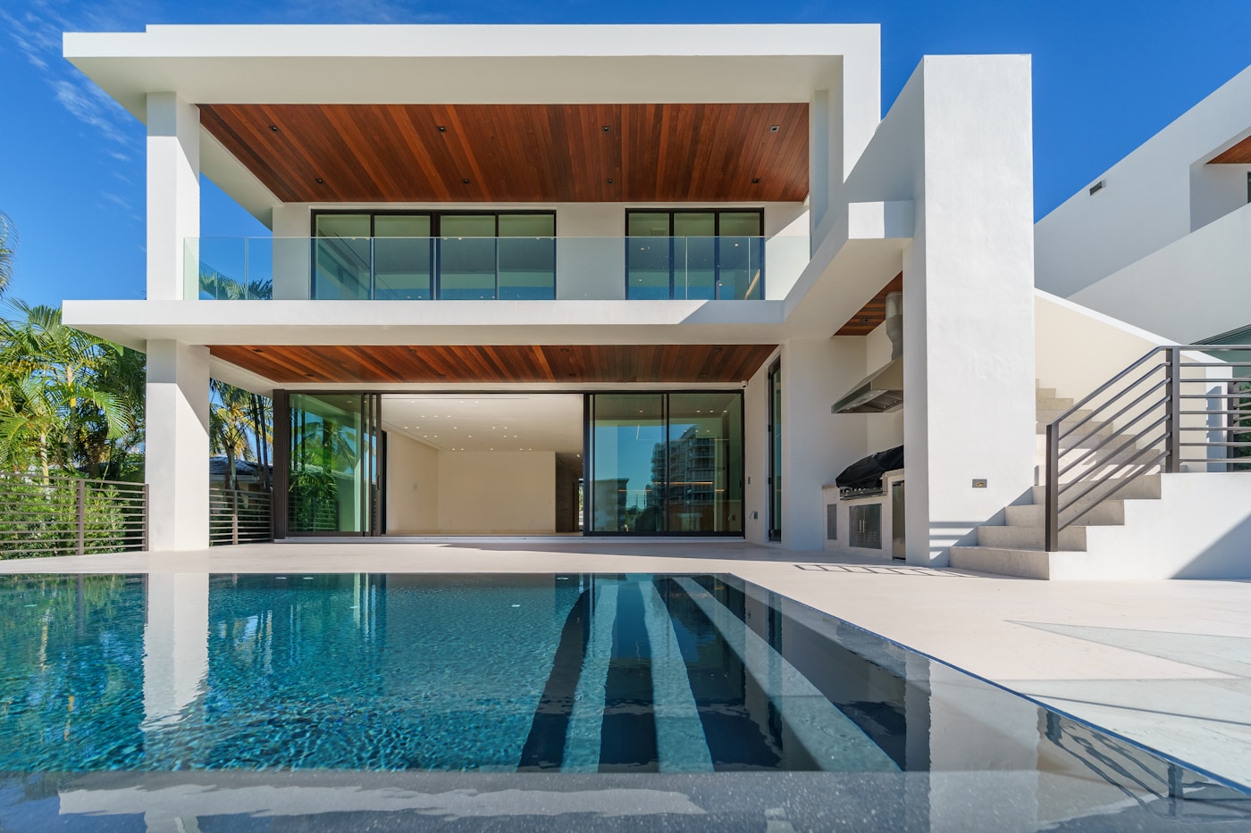 Illustrative modern home with a swimming pool